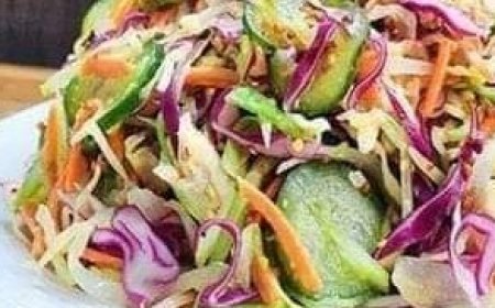 Crispy cabbage salad topped with a dressing