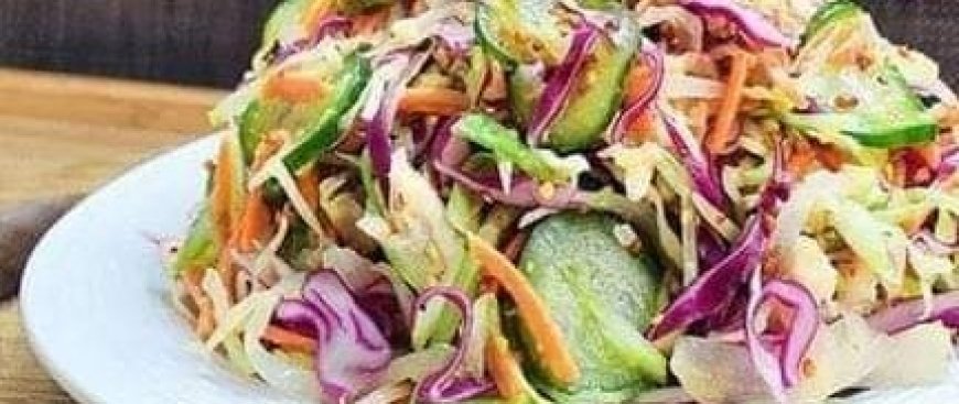 Crispy cabbage salad topped with a dressing