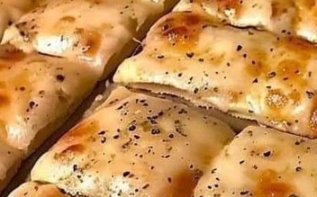 Breadsticks with cheese and garlic made at home.