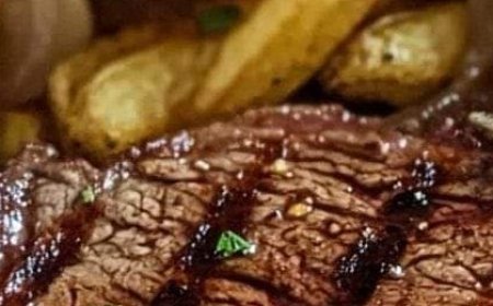 Ribeye Steak with French Onions and French Fries
