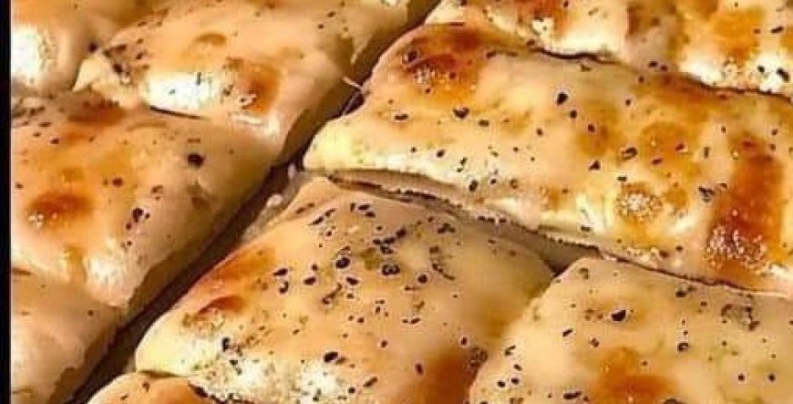 Breadsticks with cheese and garlic made at home.