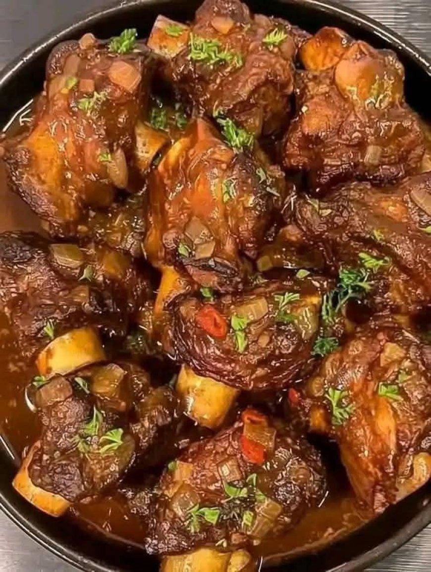 Savory Braised Oxtails with Herb-Infused Sauce