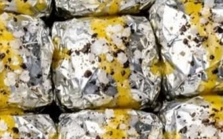 Foil Packet Party: Just 5 ingredients. Make mini foil-wrapped bombs and stack them like bricks everyone will love what's inside.
