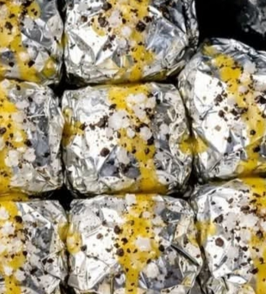 Foil Packet Party: Just 5 ingredients. Make mini foil-wrapped bombs and stack them like bricks everyone will love what's inside.